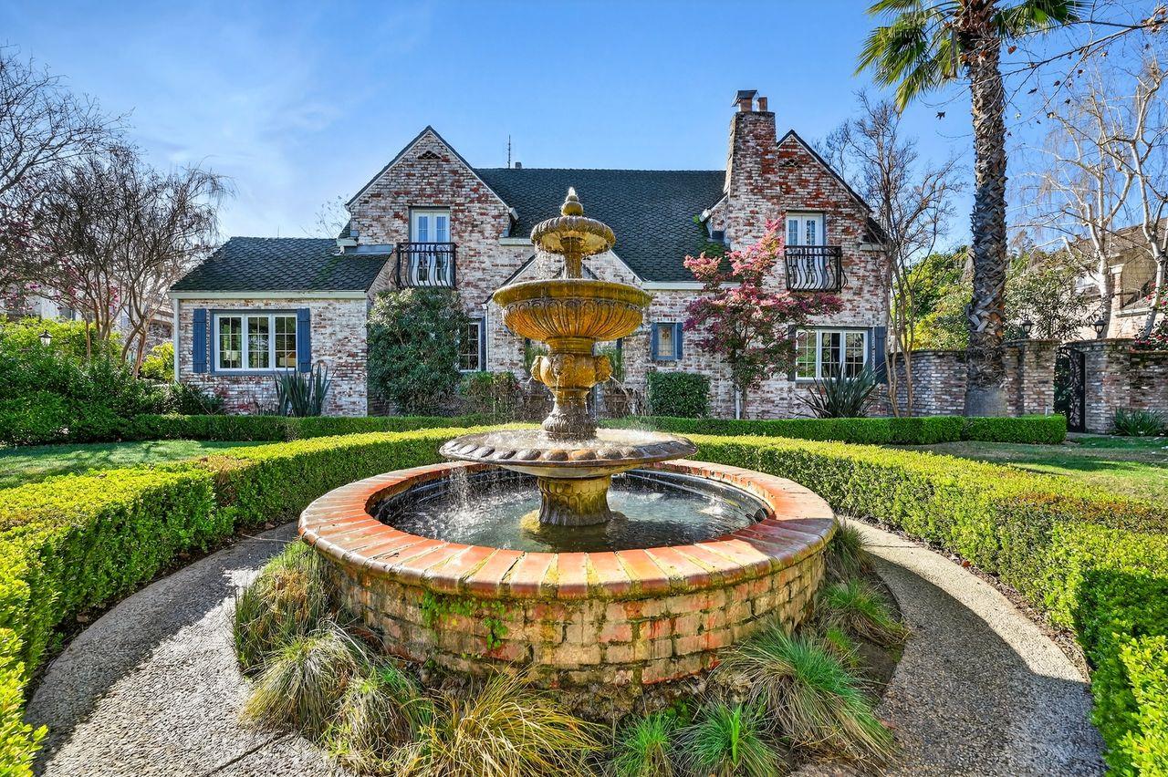 1716 Sutterville Road Sacramento, CA 95822 - Photo 1 of 57 a front view of a house with swimming pool having outdoor seating