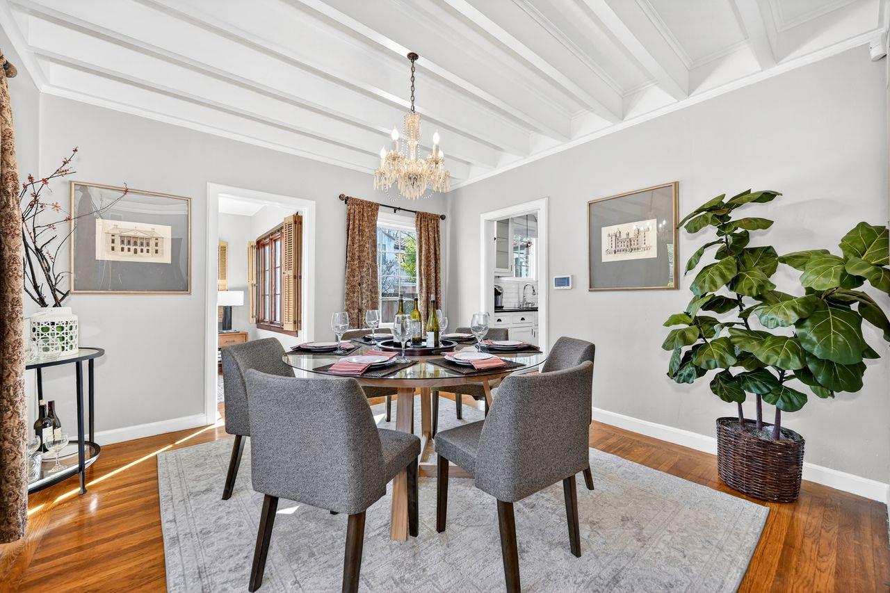 1716 Sutterville Road Sacramento, CA 95822 - Photo 11 of 57 a view of a dining room with furniture window and wooden floor