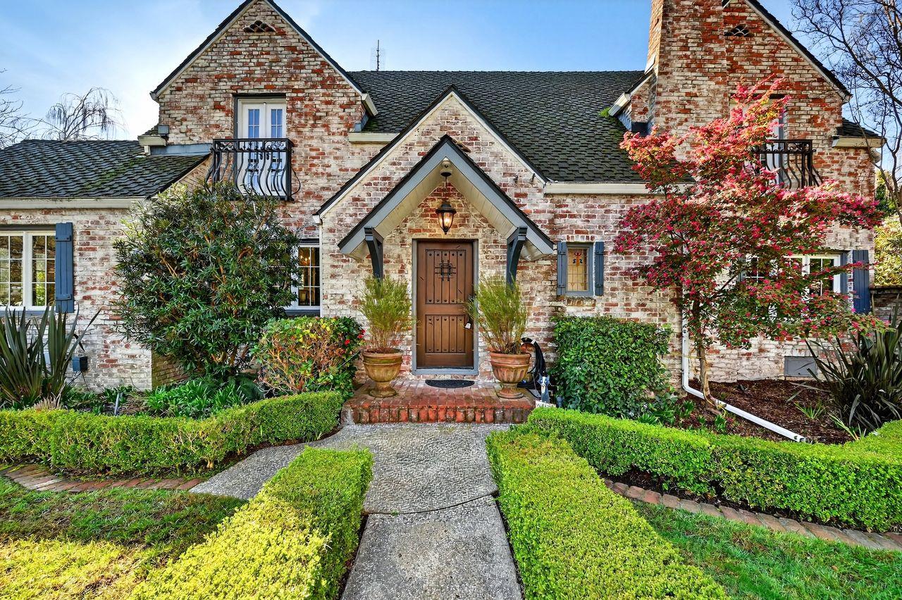 1716 Sutterville Road Sacramento, CA 95822 - Photo 2 of 57 a front view of a house with garden