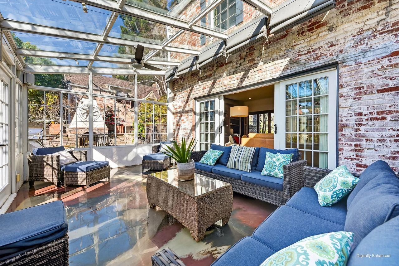 1716 Sutterville Road Sacramento, CA 95822 - Photo 22 of 57 a outdoor living space with patio furniture and a ceiling fan