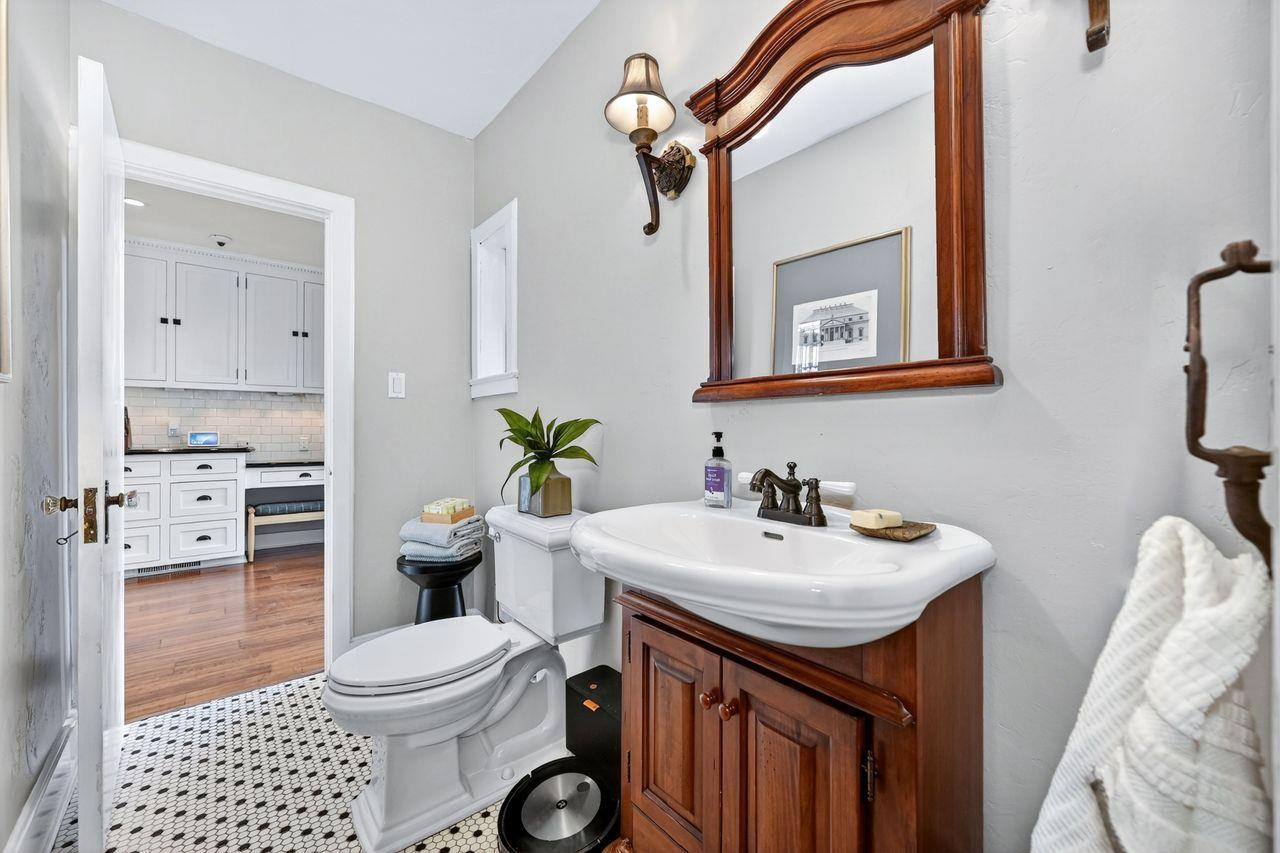1716 Sutterville Road Sacramento, CA 95822 - Photo 26 of 57 a bathroom with a sink a toilet and shower