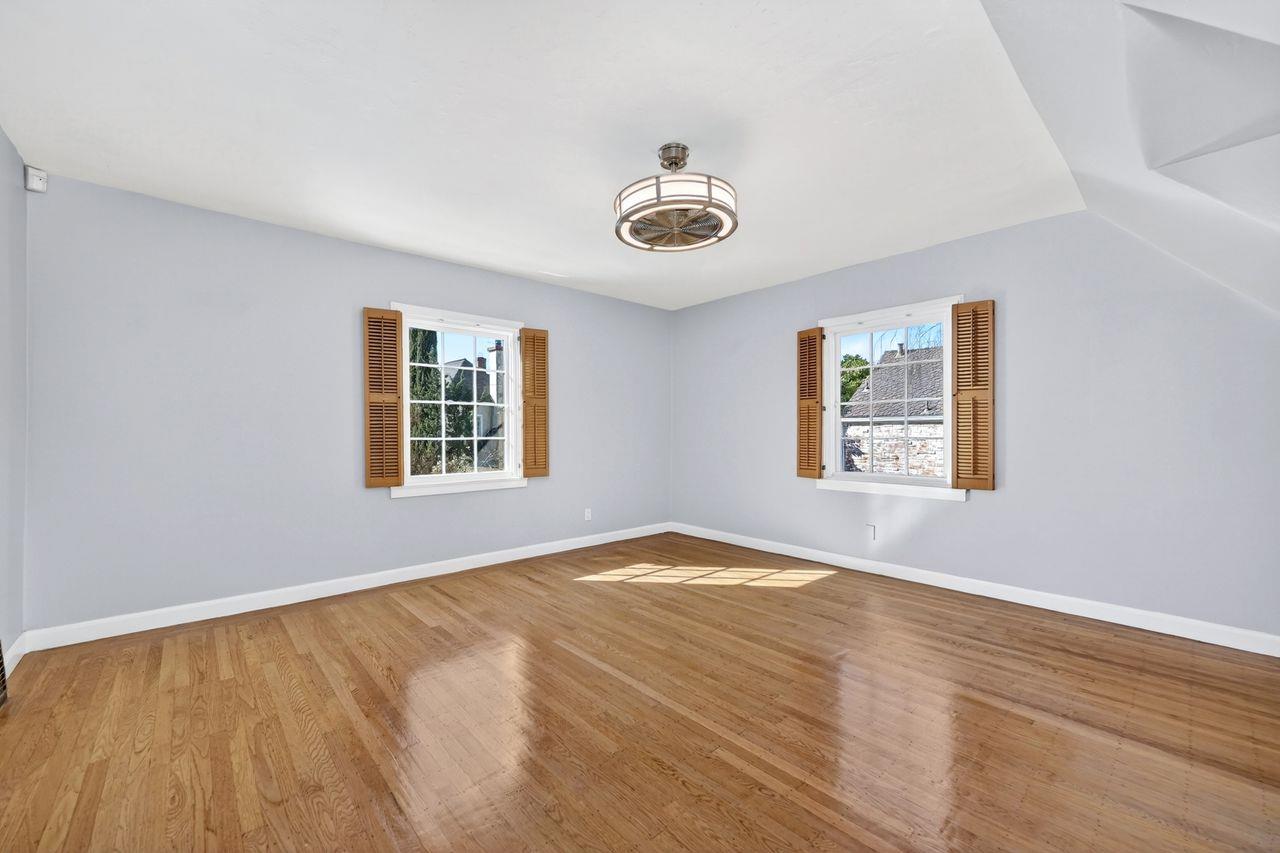 1716 Sutterville Road Sacramento, CA 95822 - Photo 29 of 57 a view of an empty room with window and wooden floor
