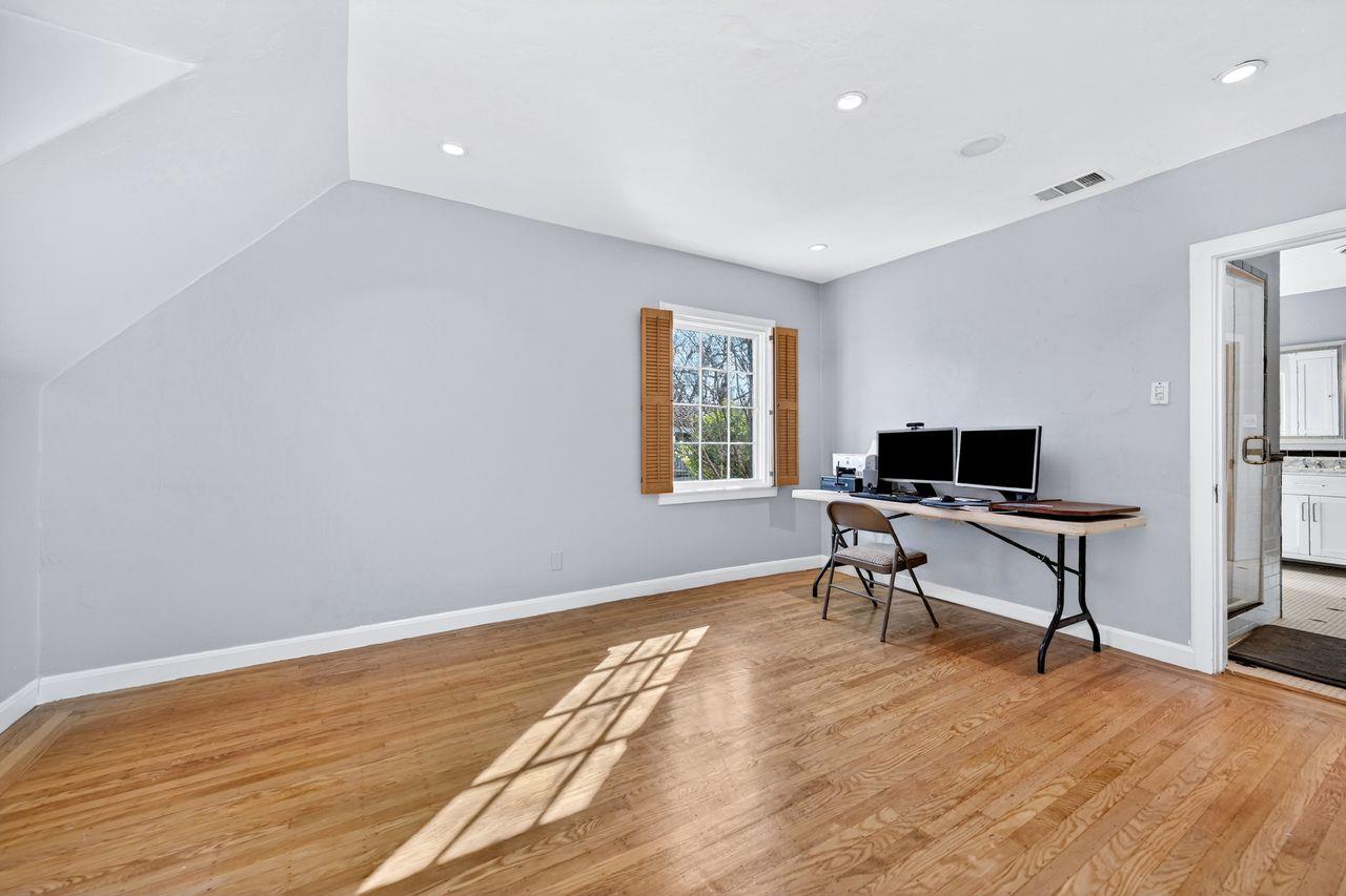 1716 Sutterville Road Sacramento, CA 95822 - Photo 31 of 57 a workspace with furniture and a window