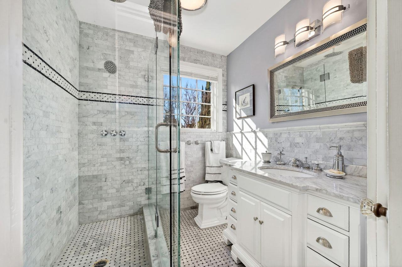 1716 Sutterville Road Sacramento, CA 95822 - Photo 33 of 57 a bathroom with a sink a toilet and shower