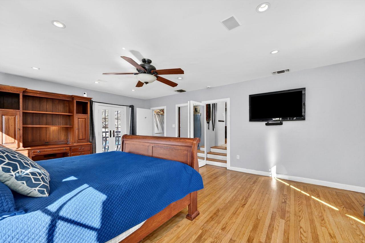 1716 Sutterville Road Sacramento, CA 95822 - Photo 36 of 57 a bedroom with furniture and a flat screen tv