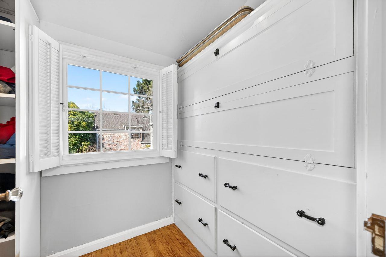 1716 Sutterville Road Sacramento, CA 95822 - Photo 38 of 57 a view of a kitchen with white cabinets and a window