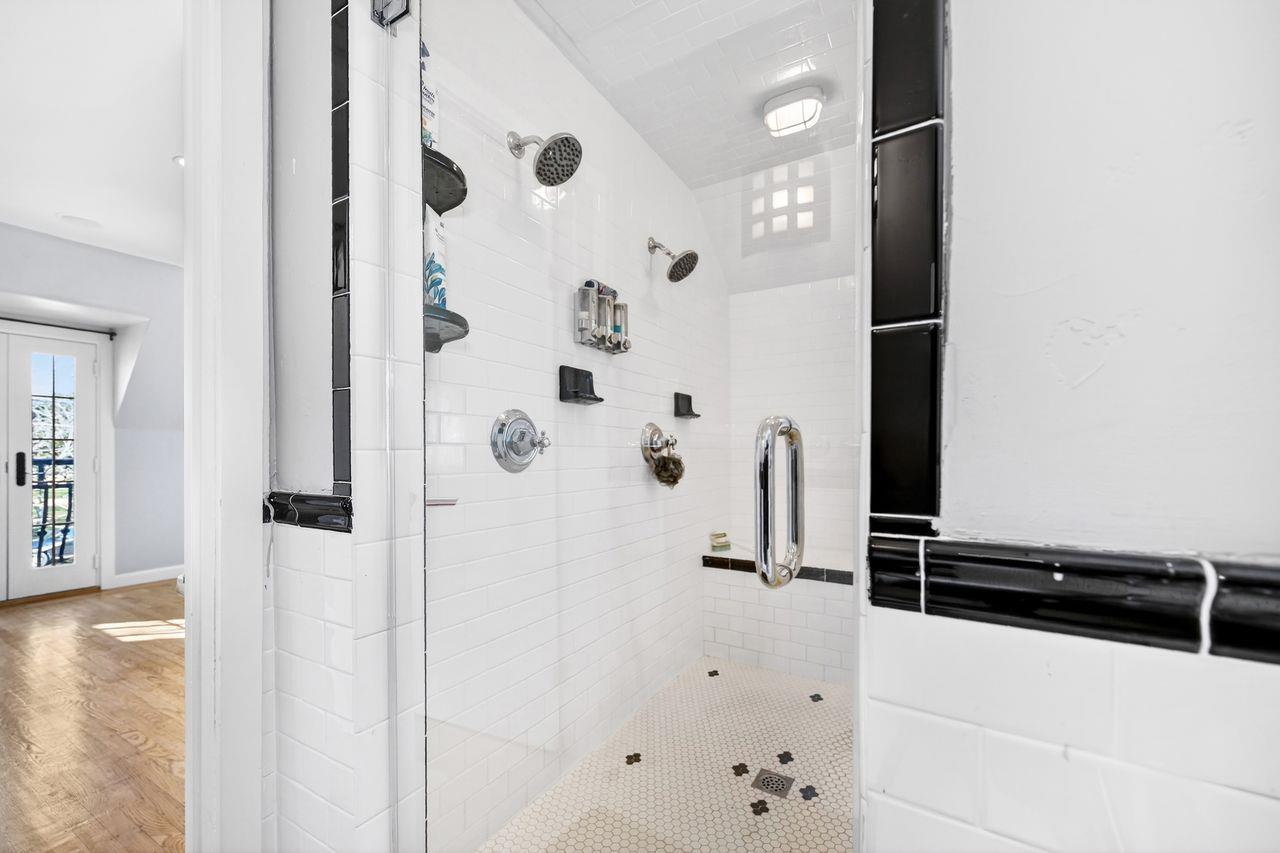 1716 Sutterville Road Sacramento, CA 95822 - Photo 40 of 57 a bathroom with a shower and a sink