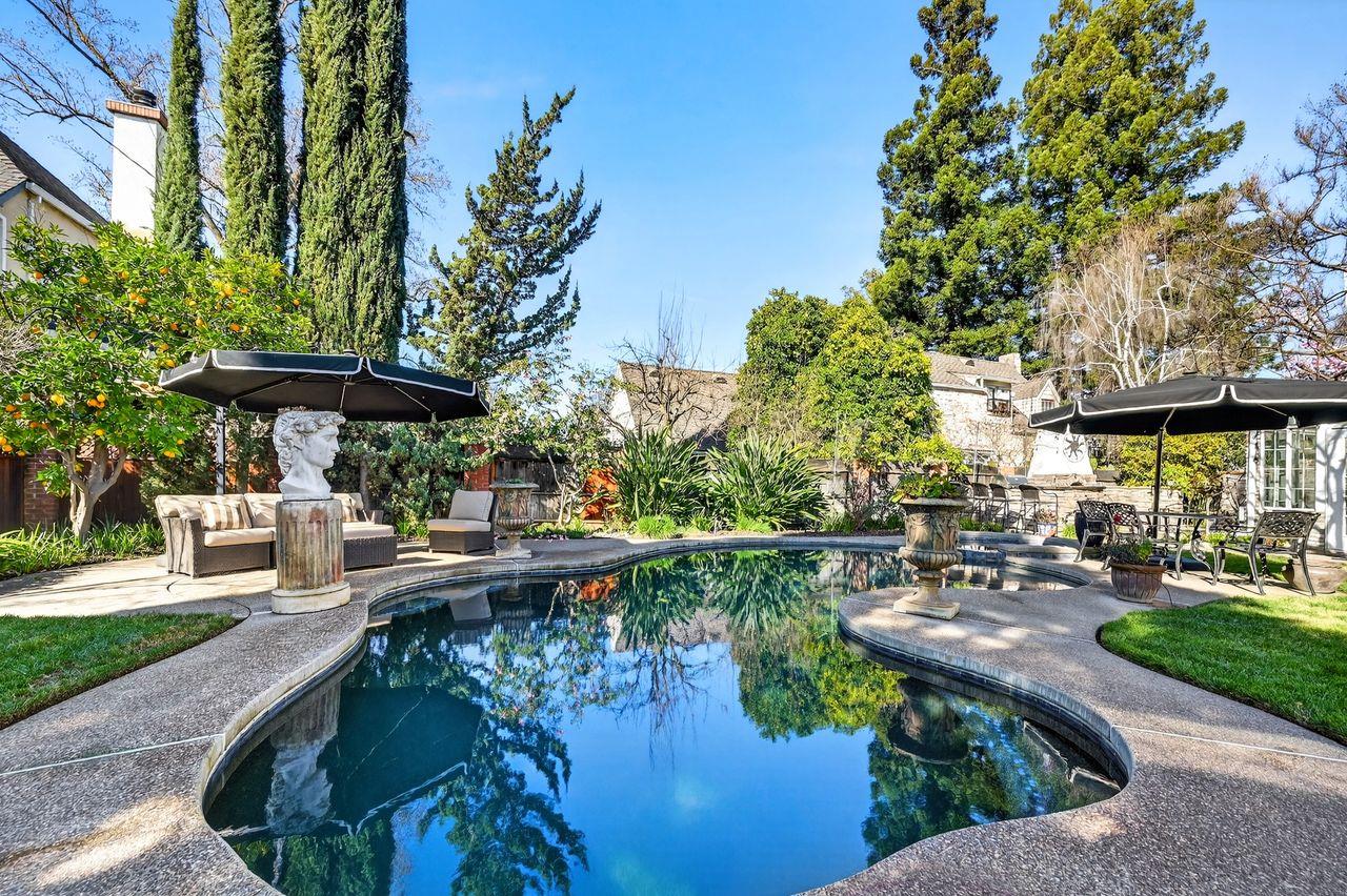 1716 Sutterville Road Sacramento, CA 95822 - Photo 41 of 57 a view of swimming pool with outdoor seating and plants