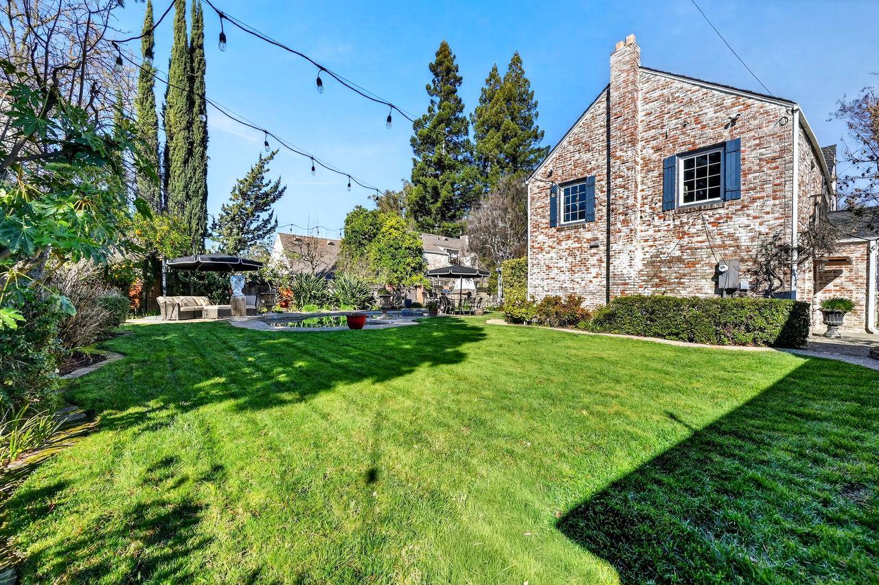 1716 Sutterville Road Sacramento, CA 95822 - Photo 47 of 57 a front view of a house with a yard