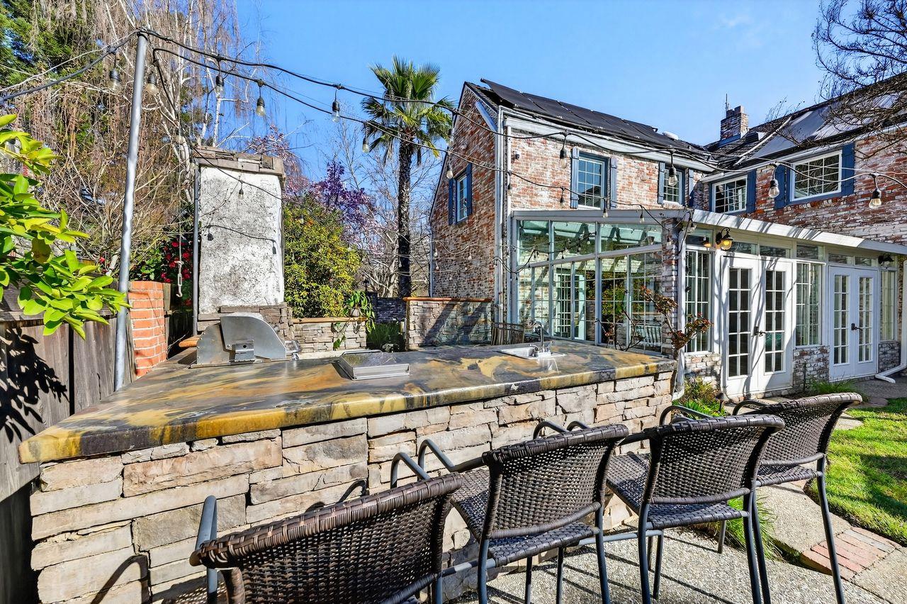 1716 Sutterville Road Sacramento, CA 95822 - Photo 50 of 57 a view of a house with backyard and sitting area