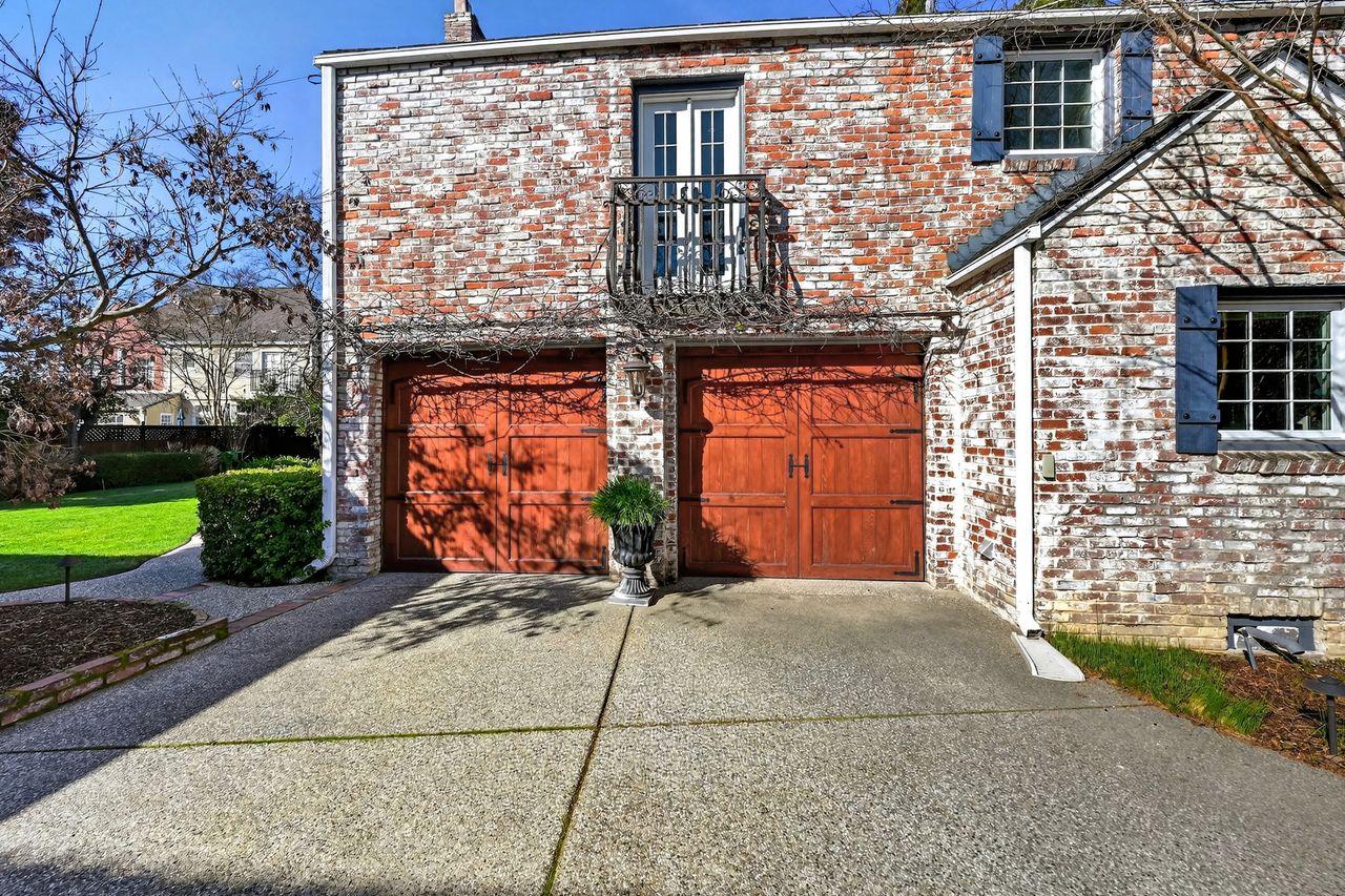 1716 Sutterville Road Sacramento, CA 95822 - Photo 54 of 57 a front view of a house with a yard and garage