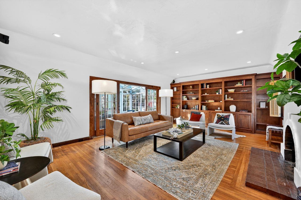 1716 Sutterville Road Sacramento, CA 95822 - Photo 7 of 57 a living room with furniture rug and wooden floor