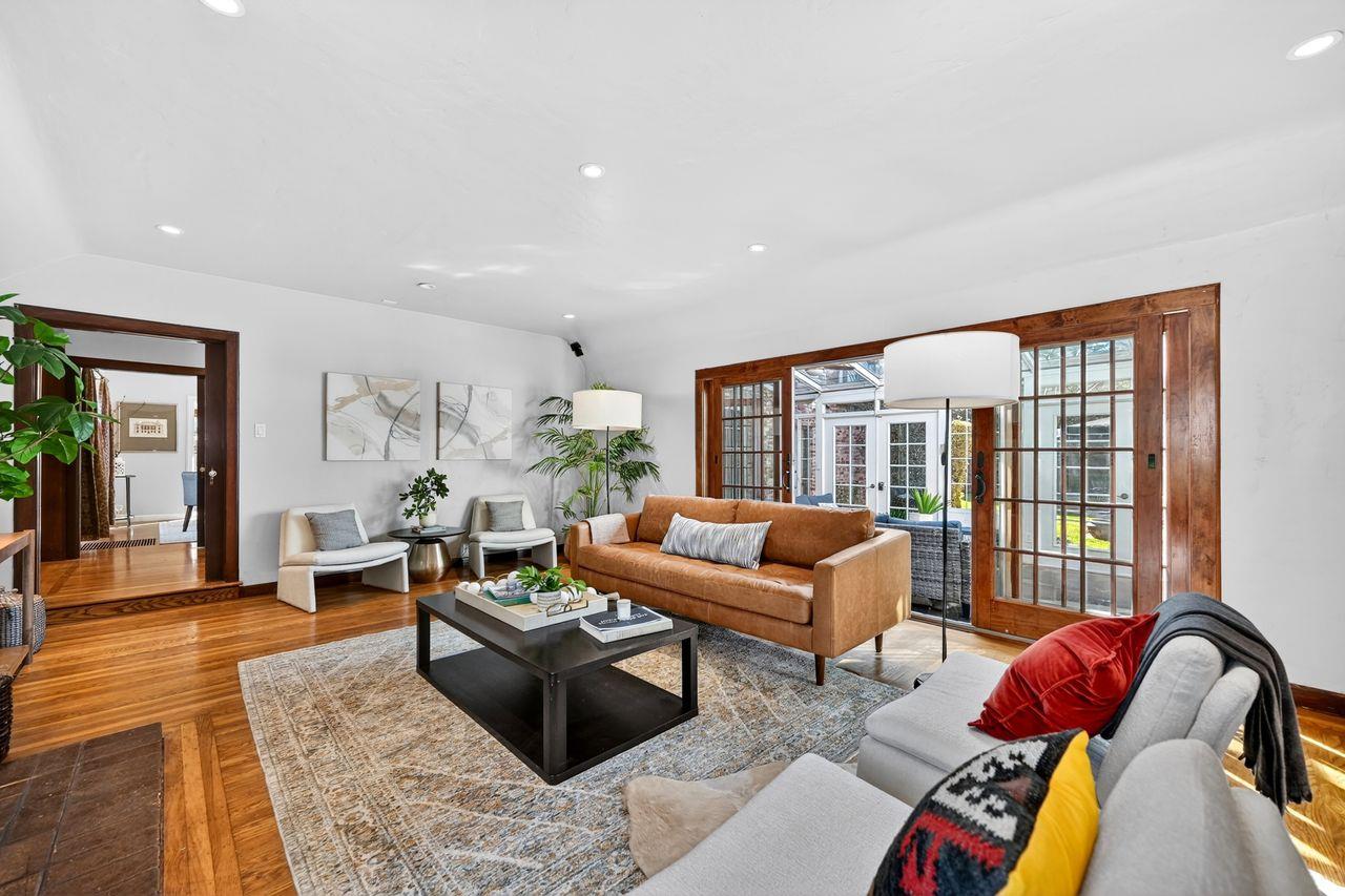 1716 Sutterville Road Sacramento, CA 95822 - Photo 10 of 57 a living room with furniture and a large window