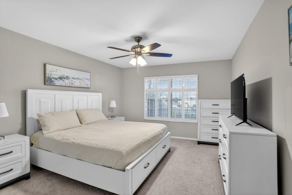 37 Middleton Court Smyrna, GA 30080 - Photo 15 of 25 a bedroom with a bed and a flat screen tv