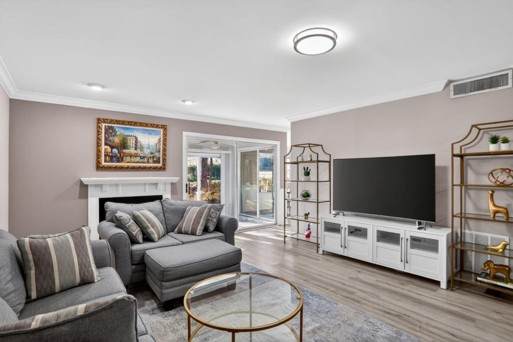 37 Middleton Court Smyrna, GA 30080 - Photo 2 of 25 a living room with furniture and a flat screen tv
