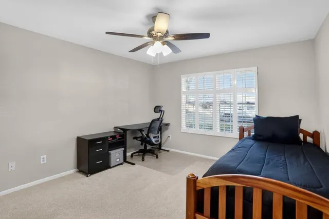 a workspace with furniture and a window