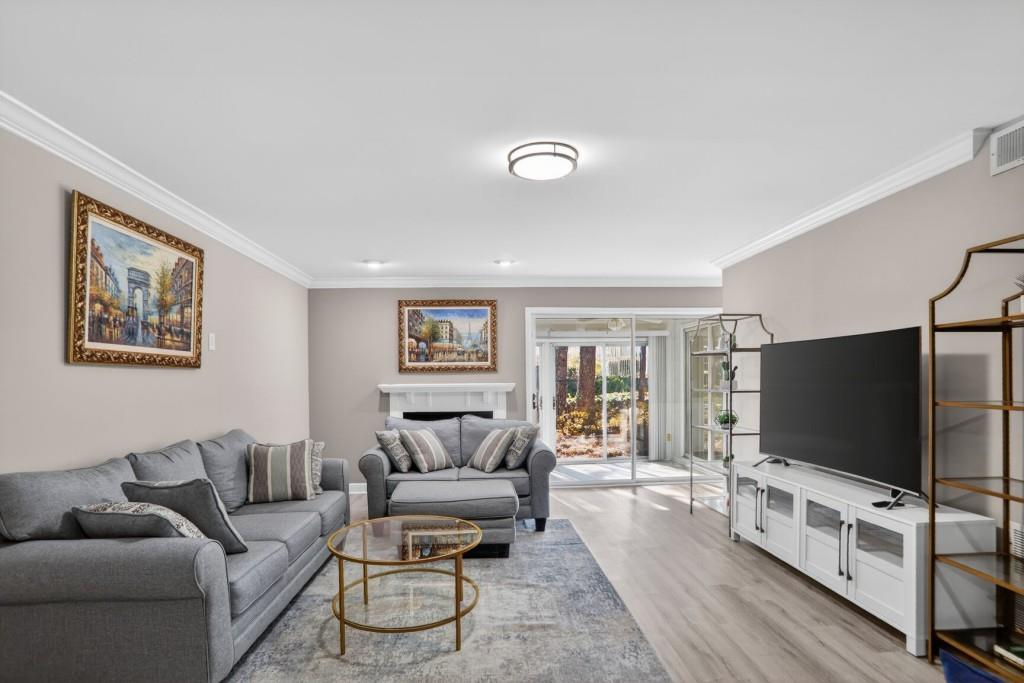 37 Middleton Court Smyrna, GA 30080 - Photo 3 of 25 a living room with furniture and a flat screen tv