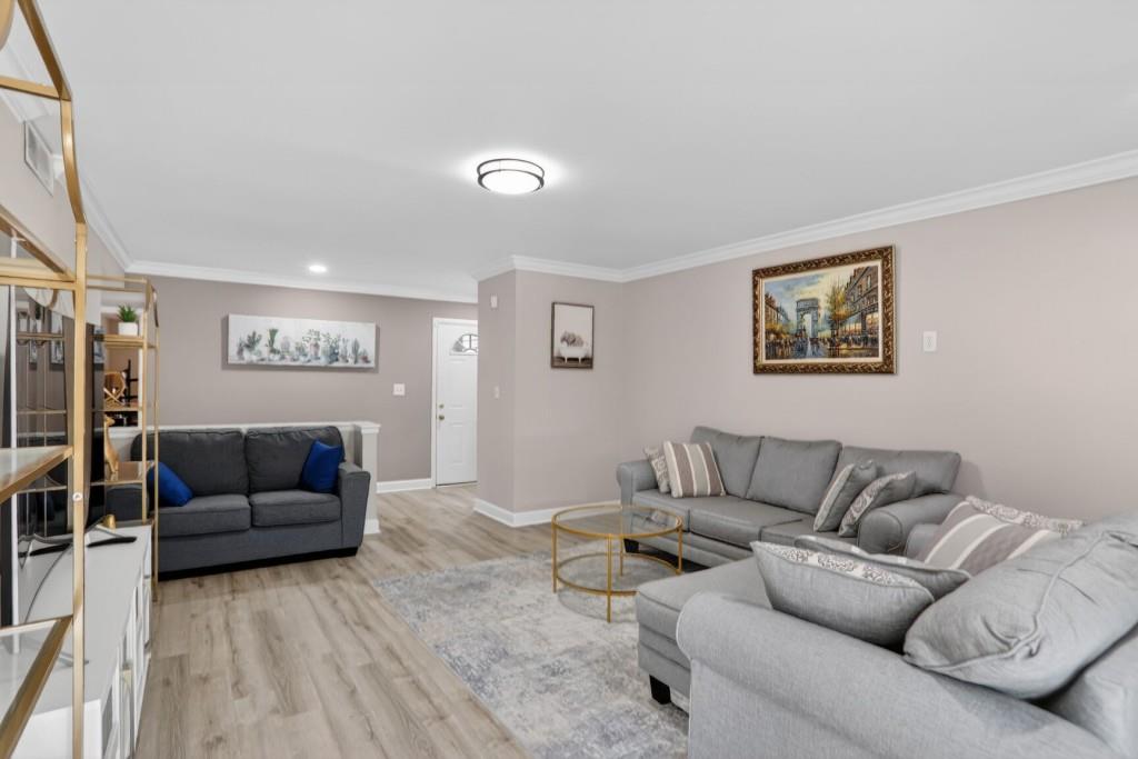 37 Middleton Court Smyrna, GA 30080 - Photo 4 of 25 a living room with furniture and a couch