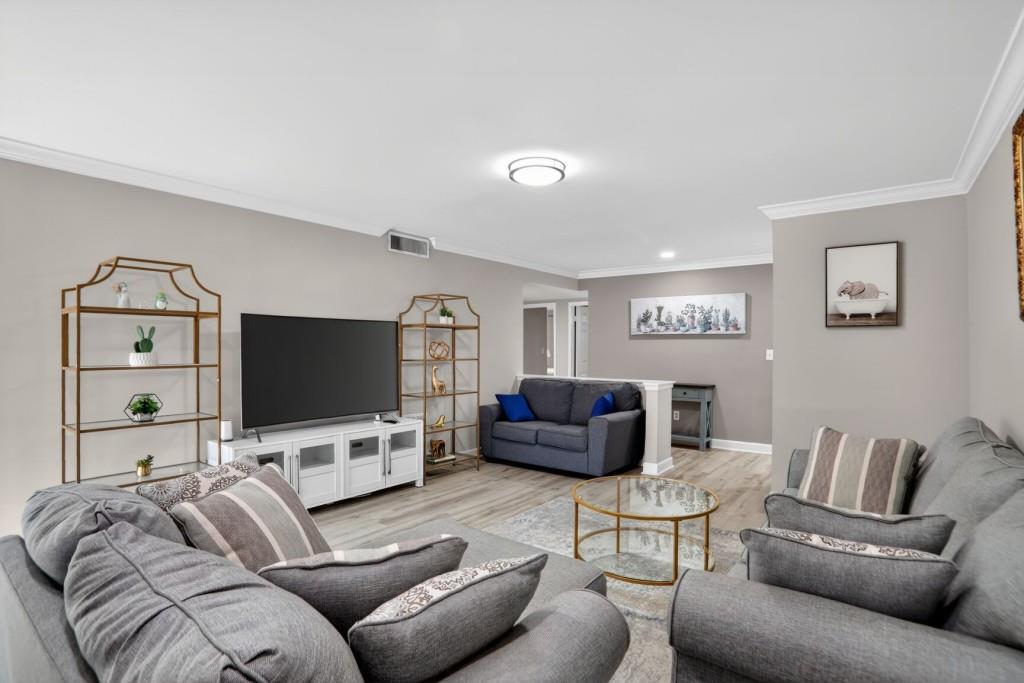 37 Middleton Court Smyrna, GA 30080 - Photo 5 of 25 a living room with furniture and a flat screen tv