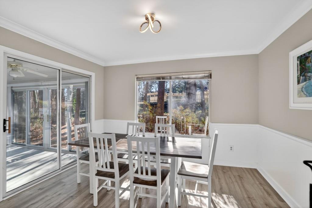 37 Middleton Court Smyrna, GA 30080 - Photo 9 of 25 a dining room with furniture a chandelier and wooden floor