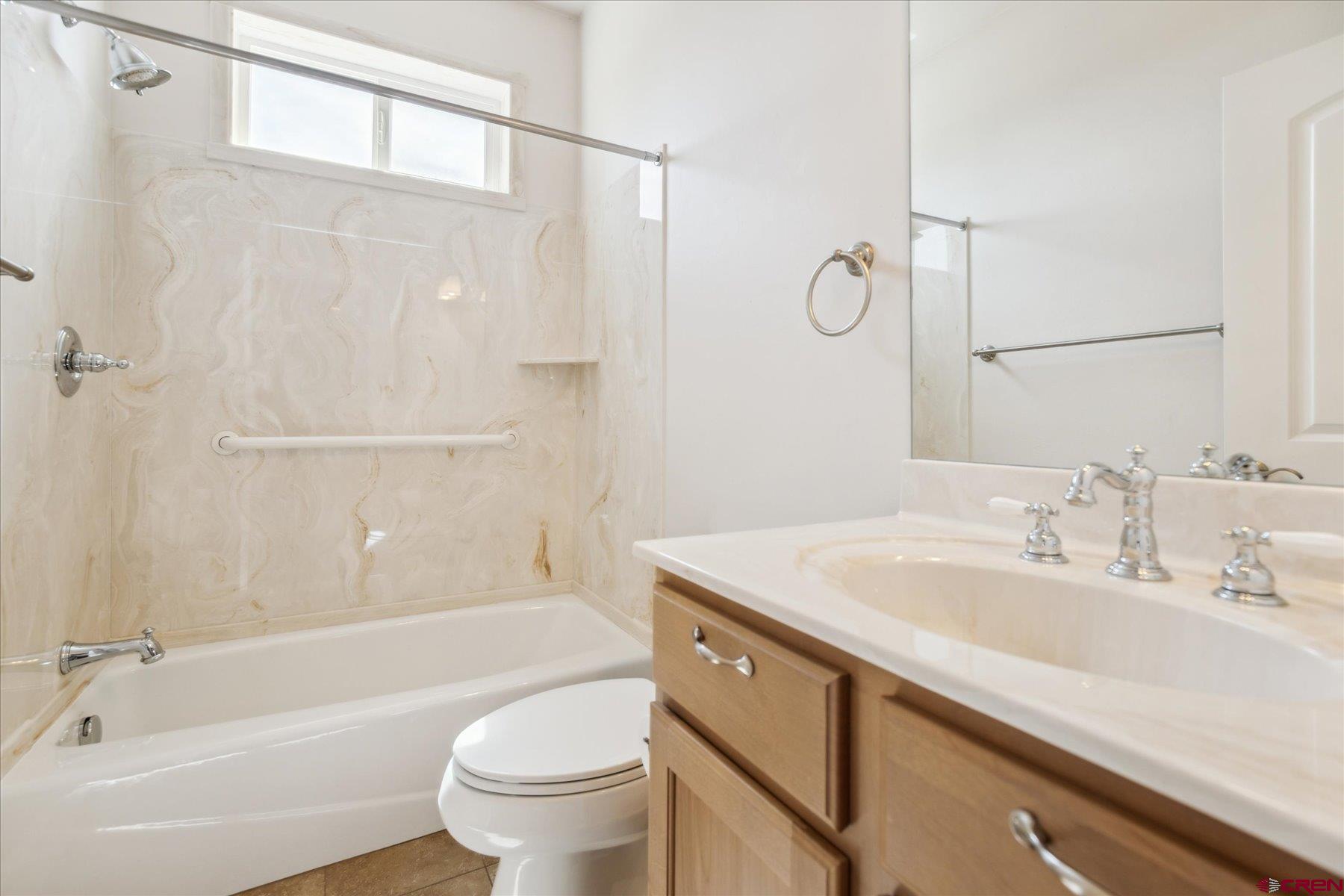 25583 Rd P Dolores, CO 81323 - Photo 21 of 34 a bathroom with a sink a toilet and a bathtub