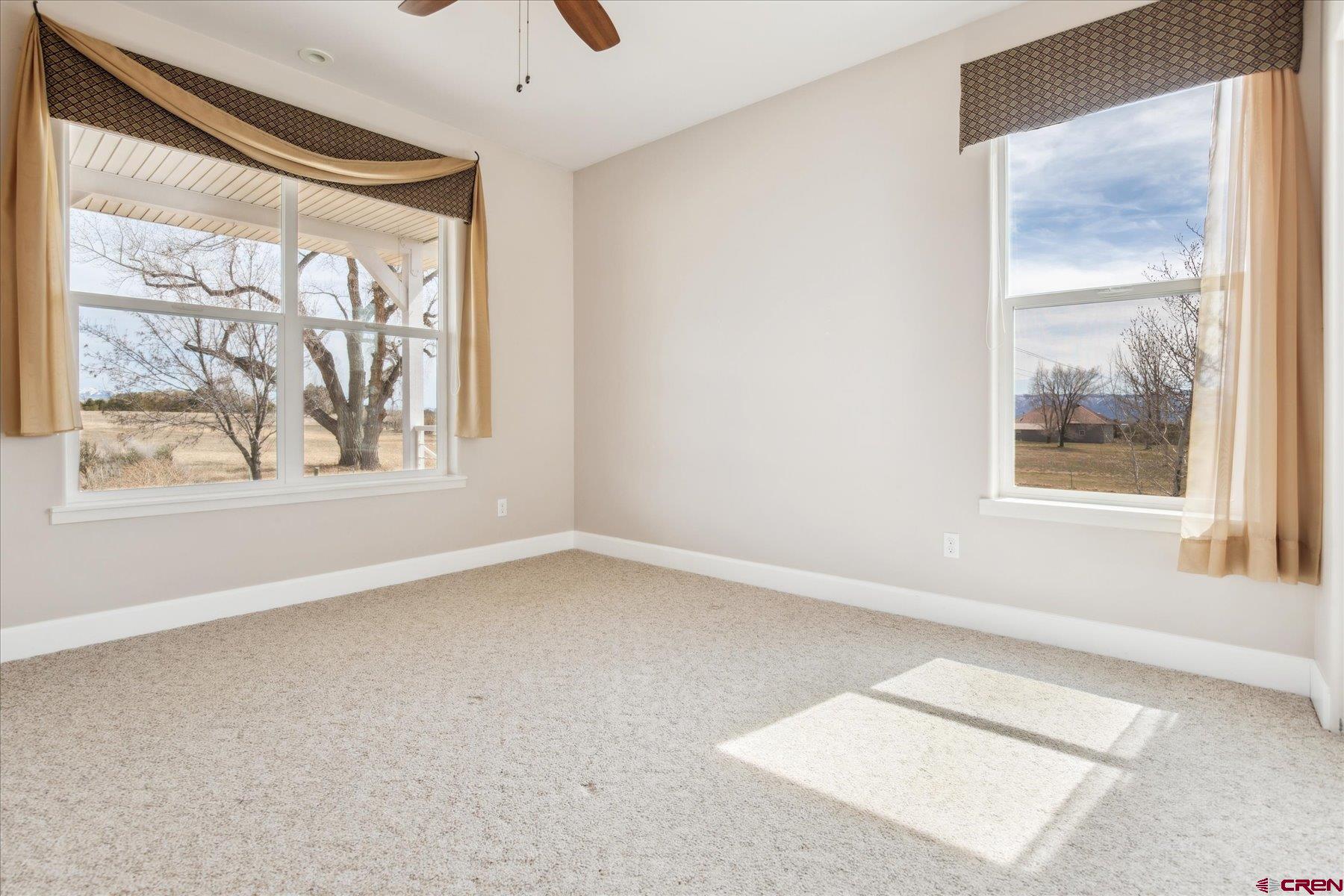25583 Rd P Dolores, CO 81323 - Photo 22 of 34 an empty room with windows