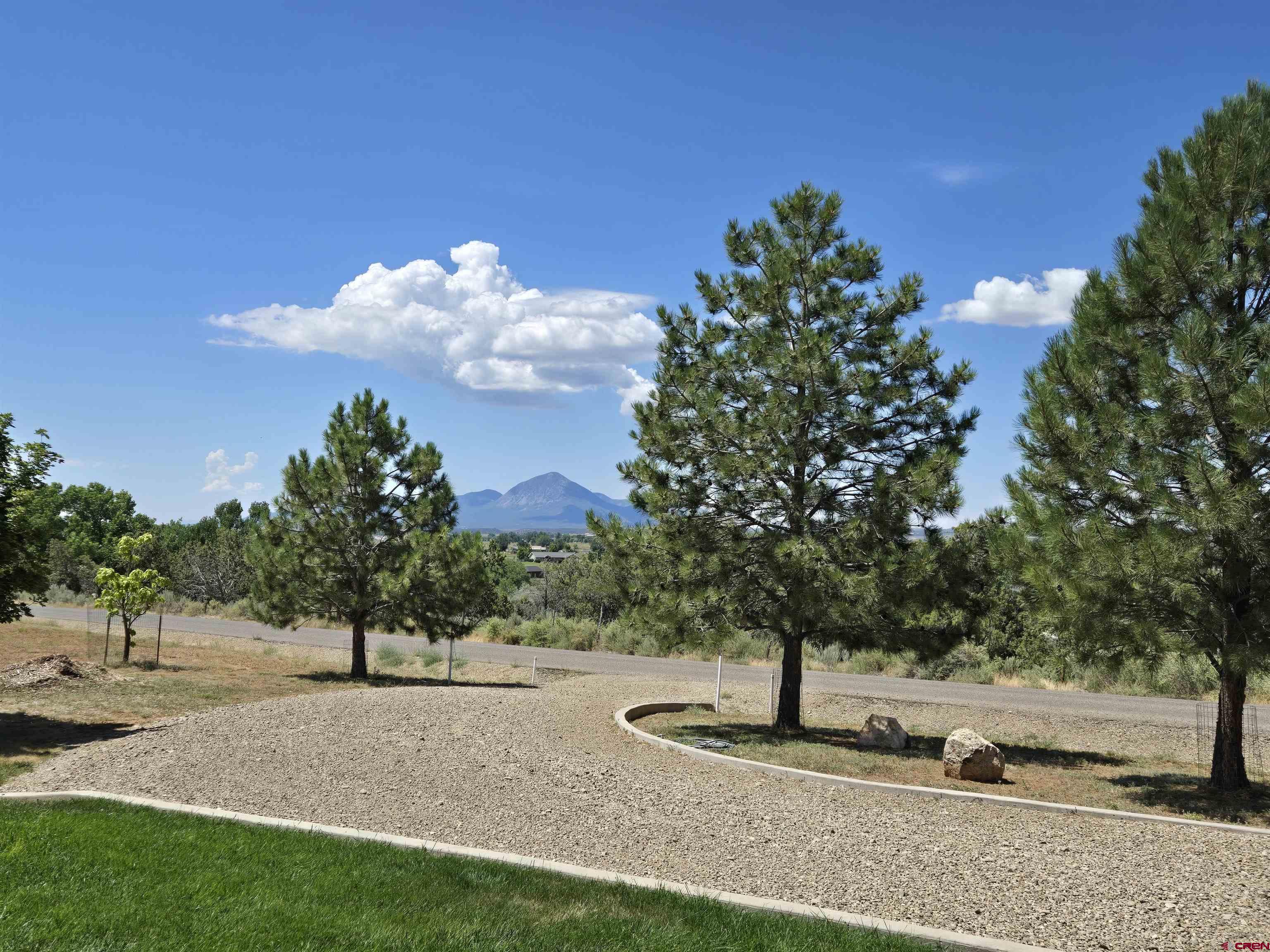 25583 Rd P Dolores, CO 81323 - Photo 34 of 34 a front view of a house with garden