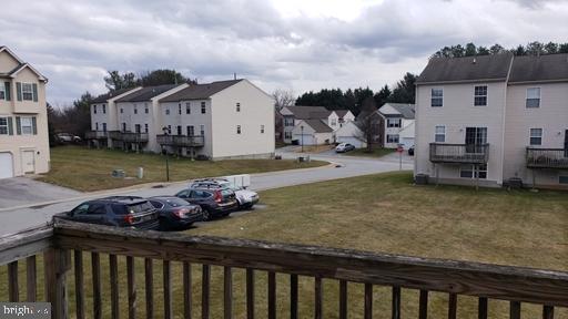 4 Bridle Path Wilmington, DE 19808 - Photo 14 of 14 a view of a house with backyard and sitting area