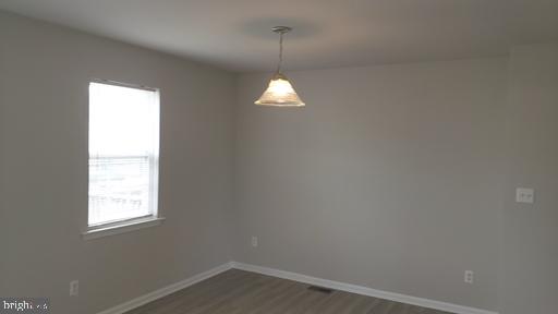 4 Bridle Path Wilmington, DE 19808 - Photo 8 of 14 en empty room with a window