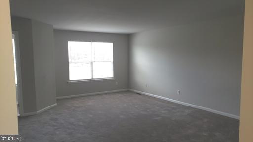 4 Bridle Path Wilmington, DE 19808 - Photo 9 of 14 an empty room with a window