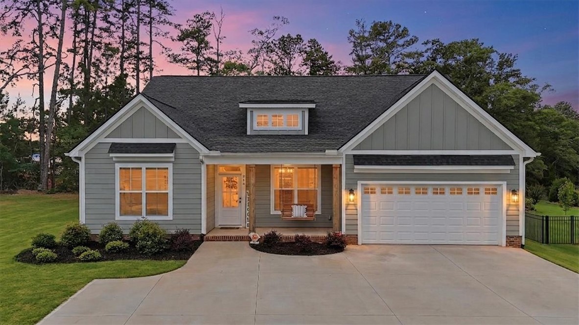 214 Timothy Court Anderson, SC 29621 - Photo 41 of 43 A welcoming front porch, attached garage, and neatly manicured landscaping enhance this home's curb appeal.