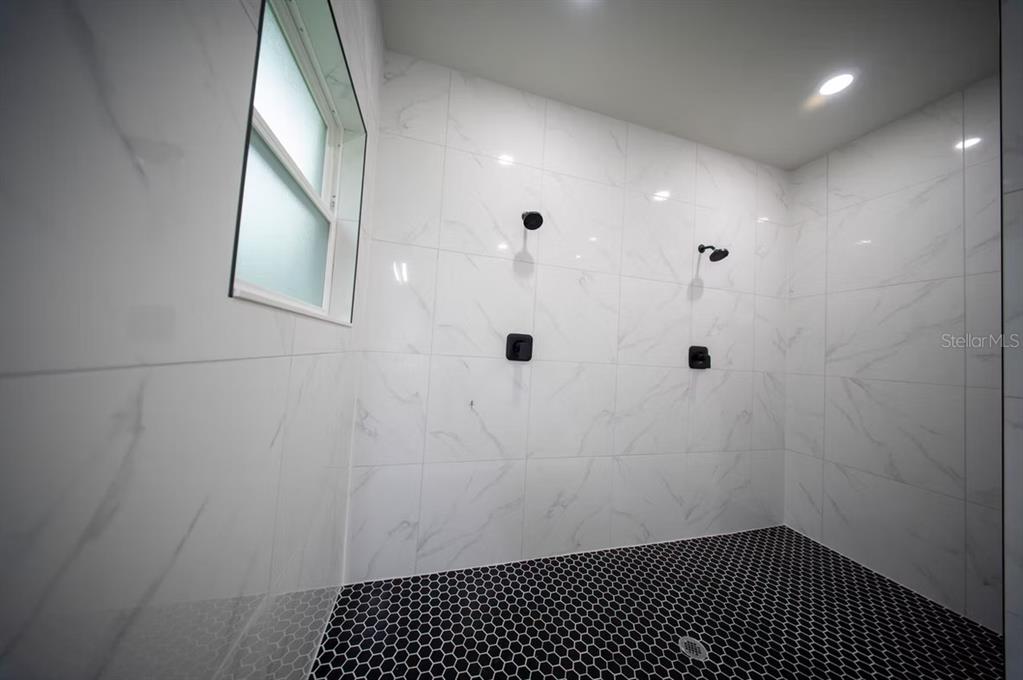 6442 North Sandborn Loop Citrus Springs, FL 34433 - Photo 18 of 33 a bathroom with a sink and a mirror