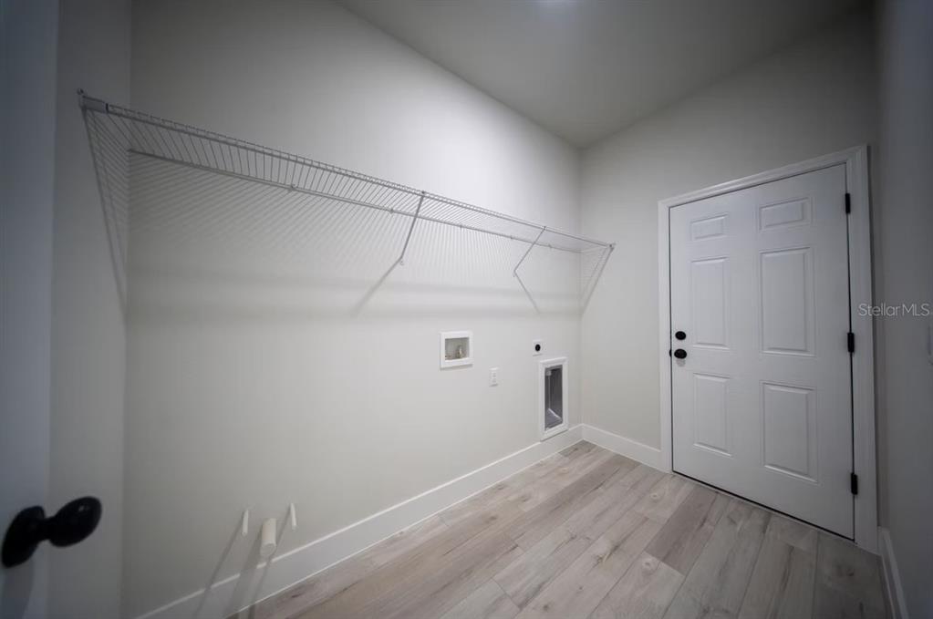 6442 North Sandborn Loop Citrus Springs, FL 34433 - Photo 25 of 33 a view of a room with wooden floor