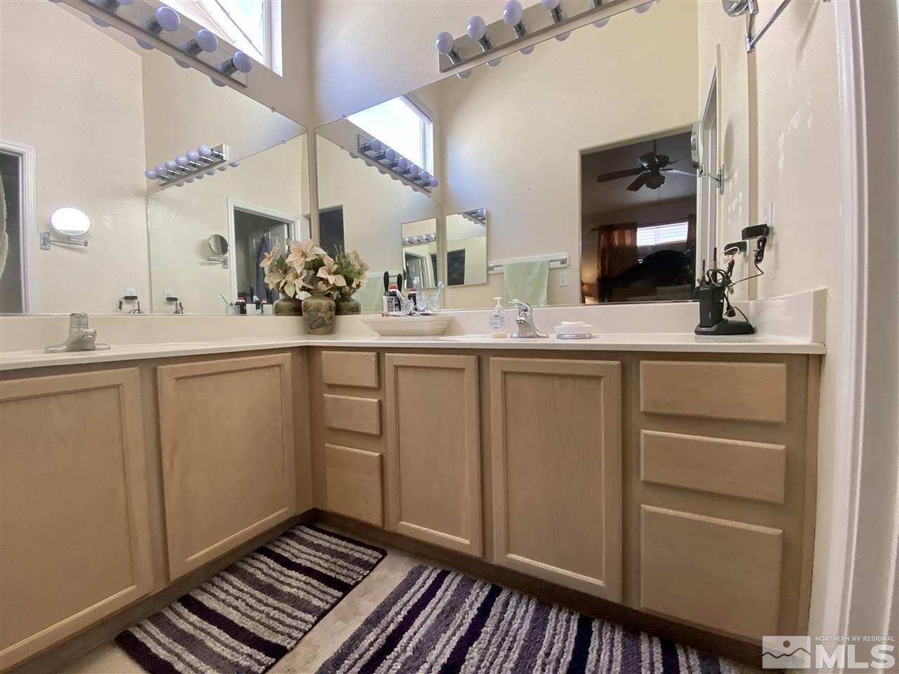 1645 Westmont Lane Reno, NV 89521 - Photo 11 of 16 a kitchen with a sink and cabinets