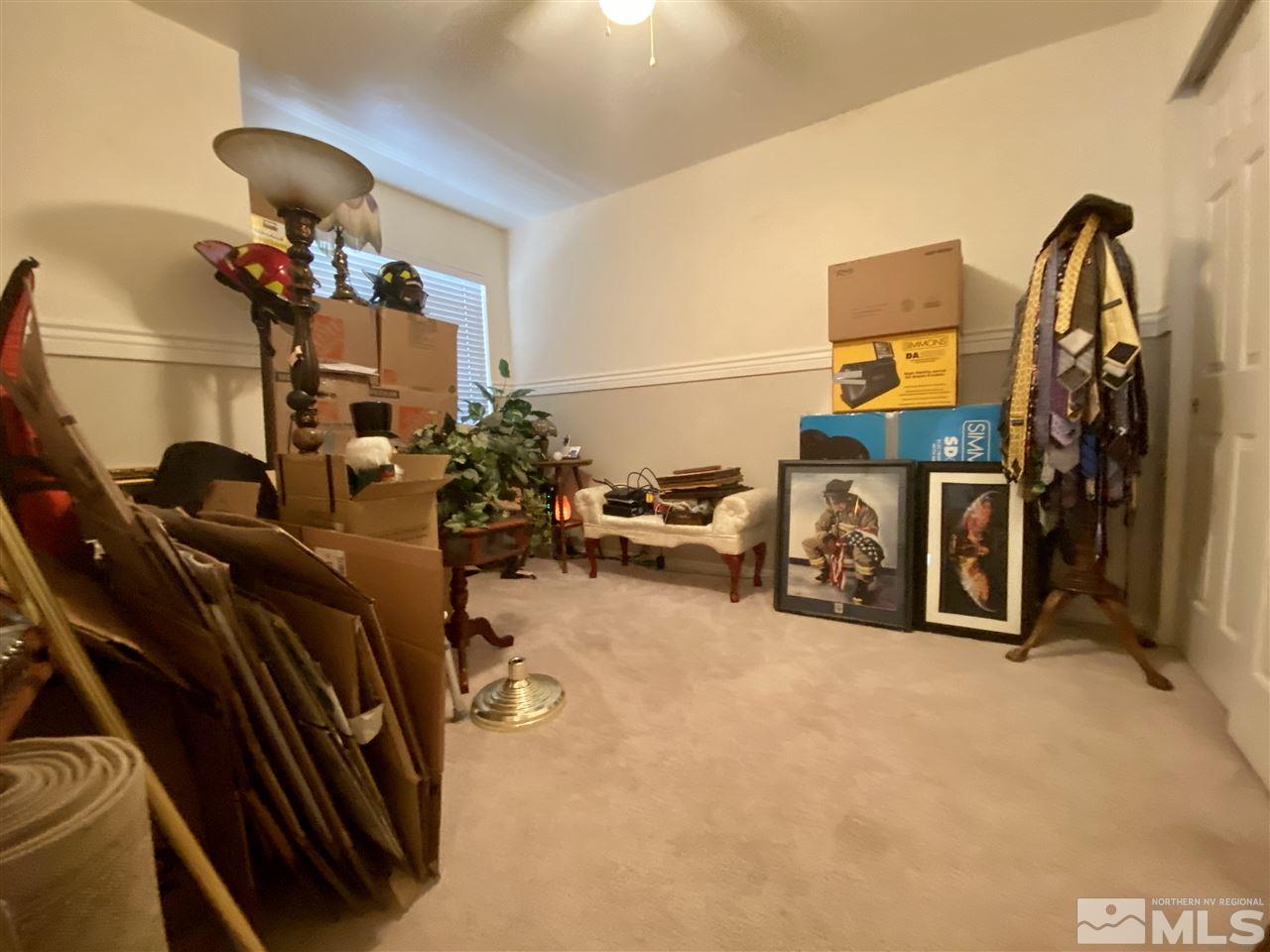 1645 Westmont Lane Reno, NV 89521 - Photo 13 of 16 a view of a room with gym equipment