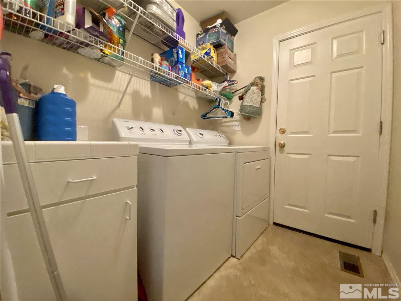 1645 Westmont Lane Reno, NV 89521 - Photo 14 of 16 a utility room with dryer and washer