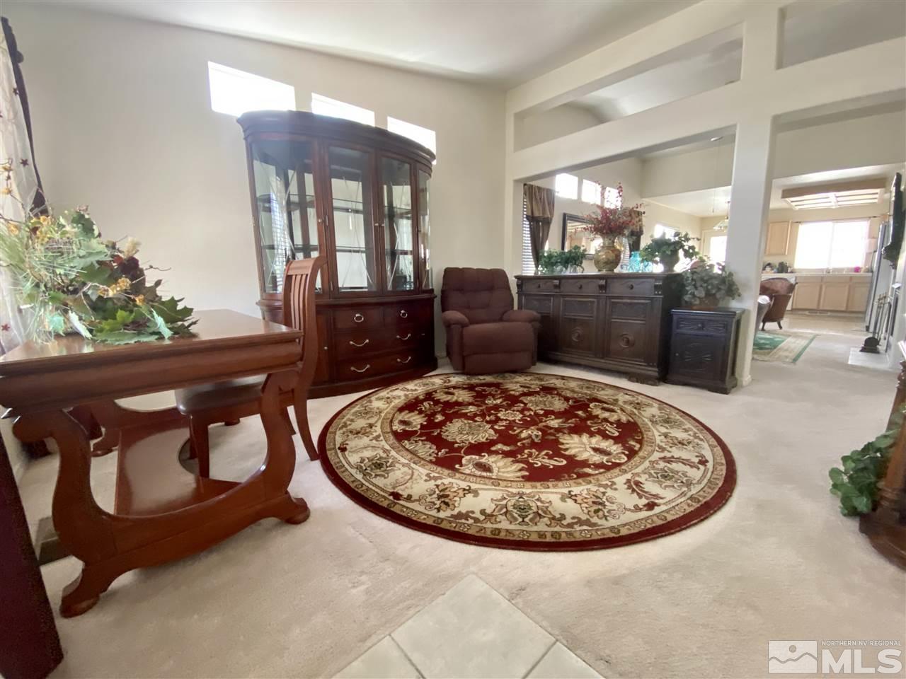 1645 Westmont Lane Reno, NV 89521 - Photo 2 of 16 a view of a dining room with furniture