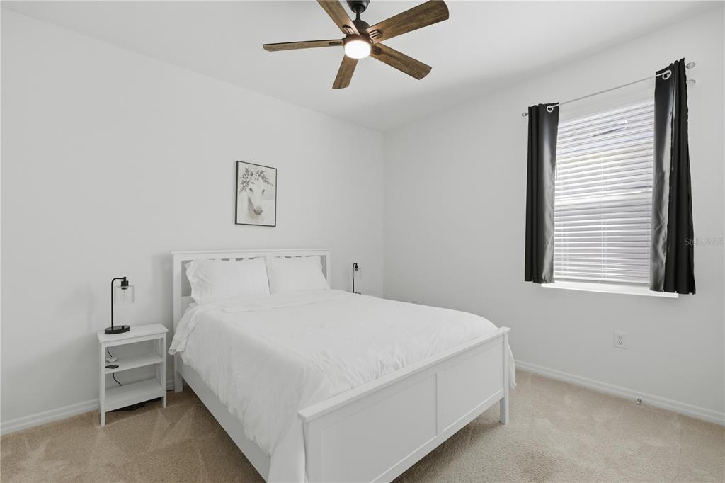 5157 Northwest 43rd Ln Road Ocala, FL 34482 - Photo 16 of 70 a bedroom with a bed and window