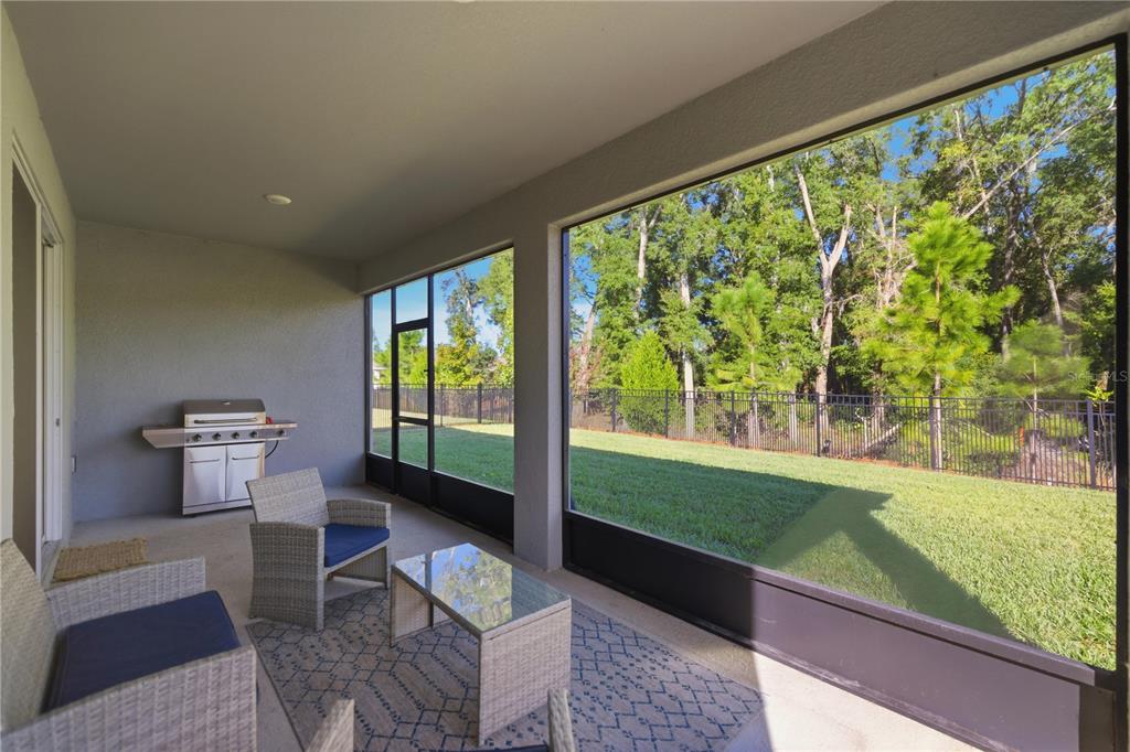 5157 Northwest 43rd Ln Road Ocala, FL 34482 - Photo 20 of 70 a living room with a yard