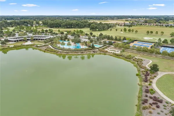 a view of a two chairs in the balcony
