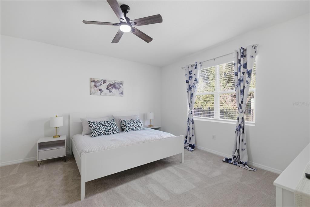 5157 Northwest 43rd Ln Road Ocala, FL 34482 - Photo 9 of 70 a bedroom with a bed and a window