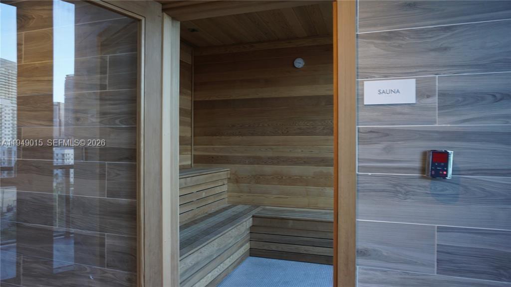 201 Southwest 17th Road, Unit 603 Miami, FL 33129 - Photo 16 of 23 a view of door and bathroom