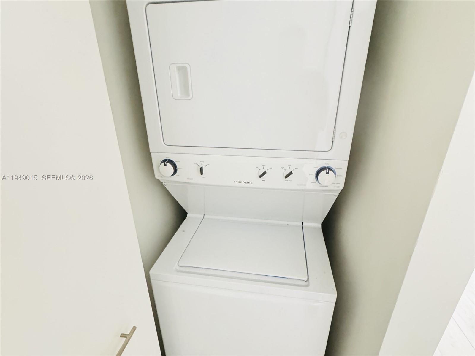 201 Southwest 17th Road, Unit 603 Miami, FL 33129 - Photo 10 of 23 a utility room with dryer and washer