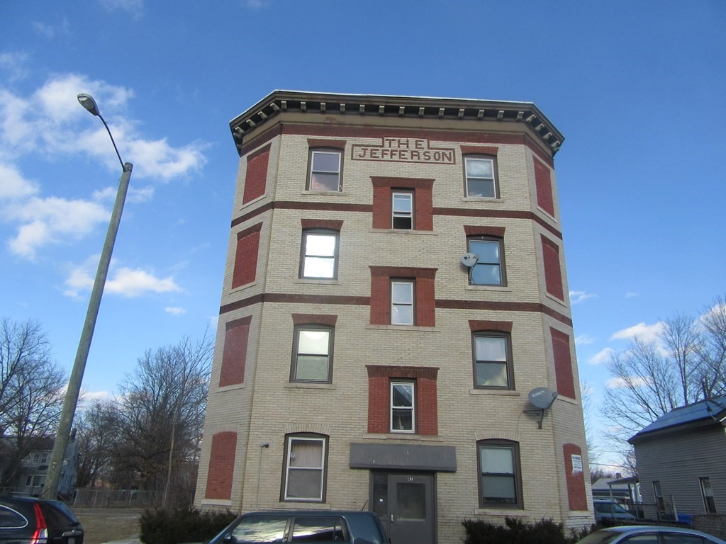 47 White Street Springfield, MA 01108 - Photo 1 of 16 a front view of a house