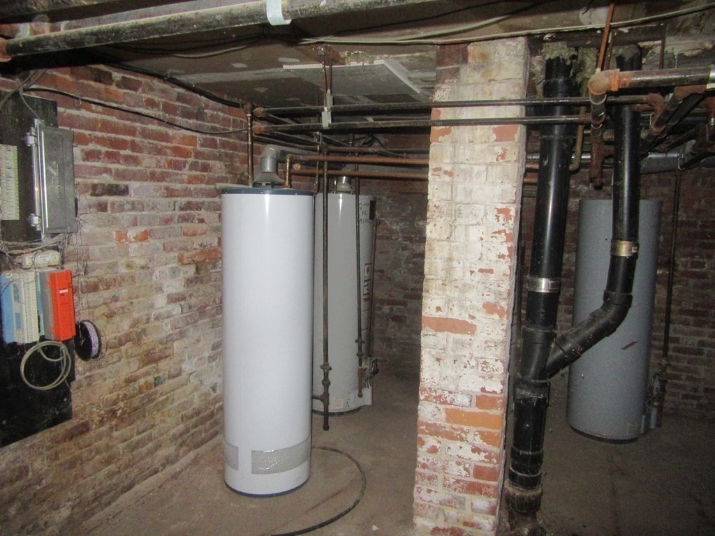 47 White Street Springfield, MA 01108 - Photo 12 of 16 a water heater room
