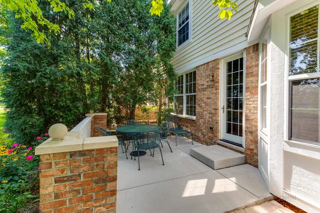 a view of outdoor sitting area with furniture