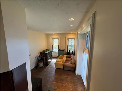 a living room with furniture and a couch