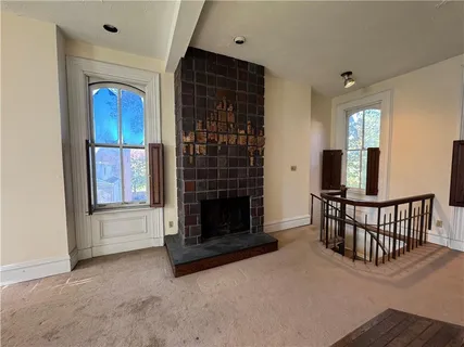 a bathroom with a sink a large mirror and vanity