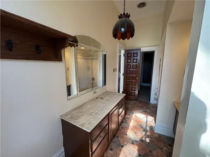 a view of empty room with windows