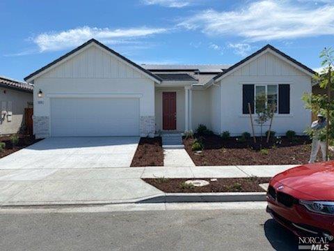 5806 Kittyhawk Place Rohnert Park, CA 94928 - Photo 1 of 1 a front view of a house with garage